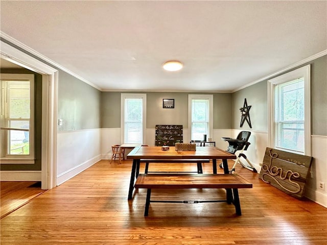 7573 State Route 21, Naples, NY 14512 - dining room featuring light wood-type flooring, ornamental molding, and baseboards