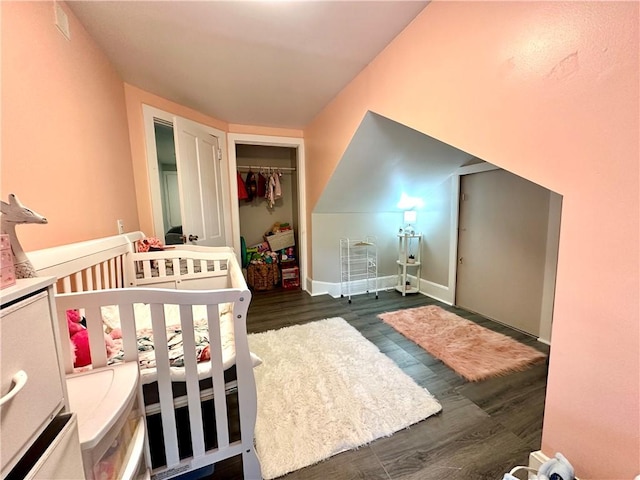 7573 State Route 21, Naples, NY 14512 - bedroom with a closet, dark wood-type flooring, and baseboards