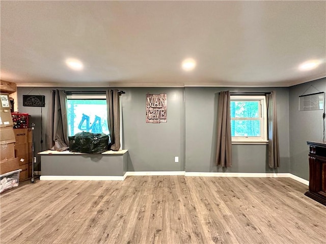 7573 State Route 21, Naples, NY 14512 - unfurnished living room with ornamental molding, wood finished floors, recessed lighting, and baseboards
