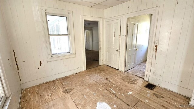 198 Mulberry St, Buffalo, NY 14204 - unfurnished room with wooden walls