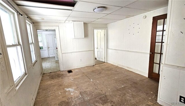 198 Mulberry St, Buffalo, NY 14204 - empty room with baseboards and a paneled ceiling