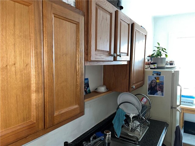571 Lake Ave, Rochester, NY 14613 - kitchen featuring freestanding refrigerator