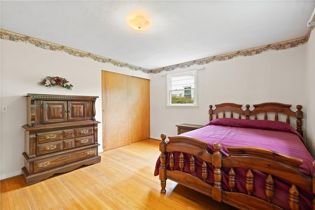 136 Cranbrooke Dr, Irondequoit, NY 14622 - bedroom featuring a closet and light wood-style flooring