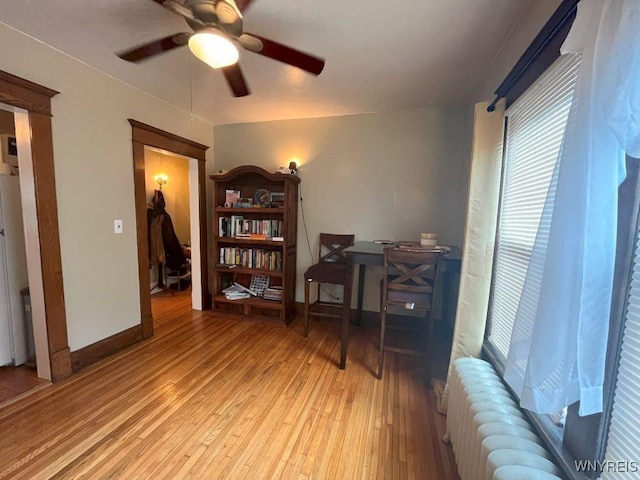 11 Cleveburn Pl Unit 1, Buffalo, NY 14222 - office area featuring radiator, light wood finished floors, and a ceiling fan