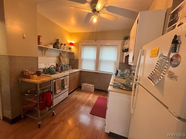 11 Cleveburn Pl Unit 1, Buffalo, NY 14222 - kitchen with white appliances, wood finished floors, ceiling fan, and light countertops