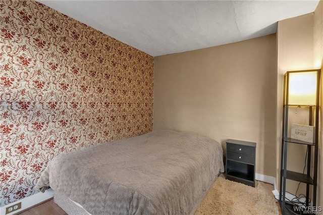 3293 Hartland Rd, Hartland, NY 14067 - bedroom featuring baseboards and wallpapered walls