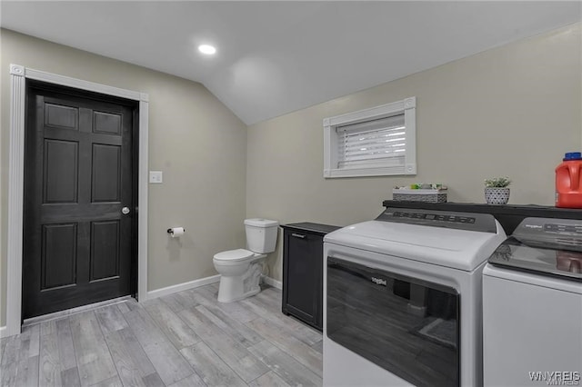 3293 Hartland Rd, Hartland, NY 14067 - laundry room with washing machine and dryer, baseboards, light wood-type flooring, and recessed lighting
