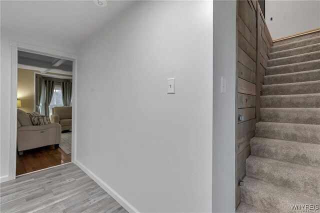 3293 Hartland Rd, Hartland, NY 14067 - stairway featuring wood finished floors and baseboards
