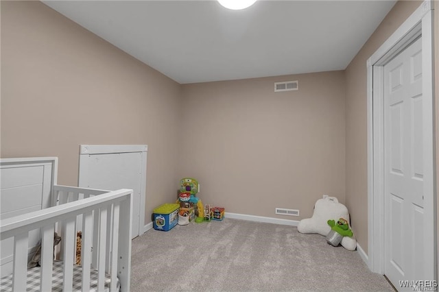 3293 Hartland Rd, Hartland, NY 14067 - unfurnished bedroom featuring carpet floors, baseboards, and a nursery area