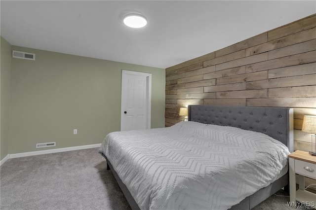 3293 Hartland Rd, Hartland, NY 14067 - carpeted bedroom with wooden walls and baseboards
