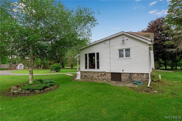 3293 Hartland Rd, Hartland, NY 14067 - view of side of property featuring a yard