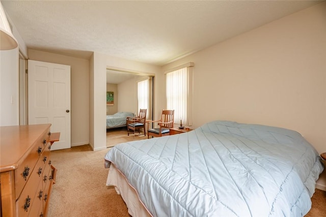 11 Brightwoods Ln, Brighton, NY 14623 - bedroom featuring light colored carpet and baseboards