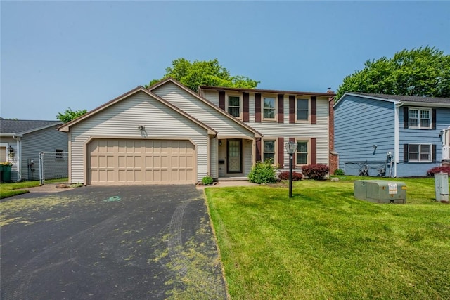 11 Brightwoods Ln, Brighton, NY 14623 - view of front of house with an attached garage, asphalt driveway, and a front lawn