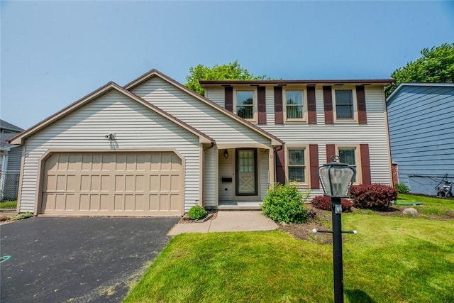 11 Brightwoods Ln, Brighton, NY 14623 - view of front facade featuring an attached garage, driveway, and a front yard