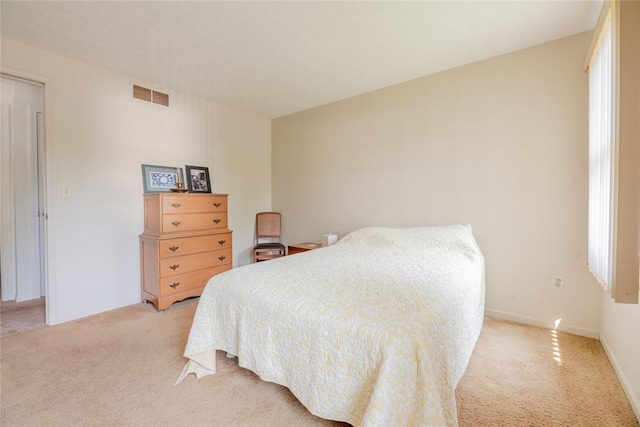 11 Brightwoods Ln, Brighton, NY 14623 - bedroom with light carpet and baseboards