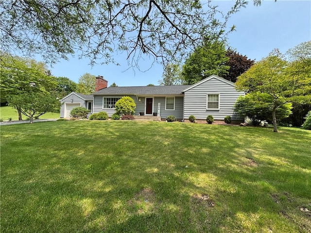 46 Dickerson St, Lyons, NY 14489 - ranch-style house featuring a front yard, a chimney, and an attached garage