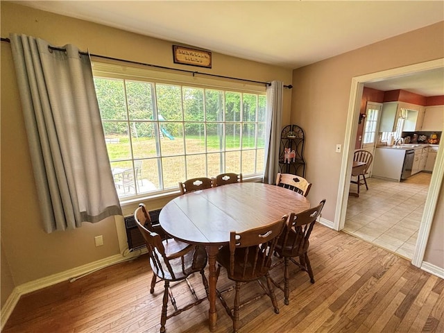 46 Dickerson St, Lyons, NY 14489 - dining space with light wood-type flooring and baseboards