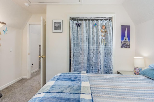 2703 Lembke Rd, Arcadia, NY 14489 - carpeted bedroom with vaulted ceiling and baseboards