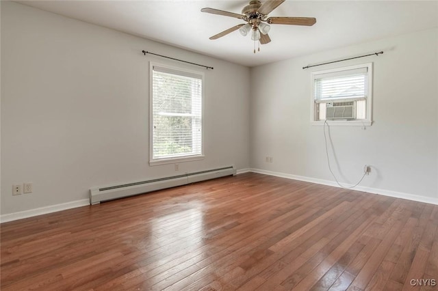25386 Stewart Dr, Champion, NY 13619 - spare room with baseboard heating, wood-type flooring, a ceiling fan, baseboards, and cooling unit