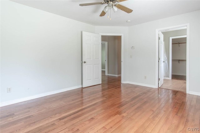 25386 Stewart Dr, Champion, NY 13619 - unfurnished room featuring light wood-style flooring, ceiling fan, and baseboards