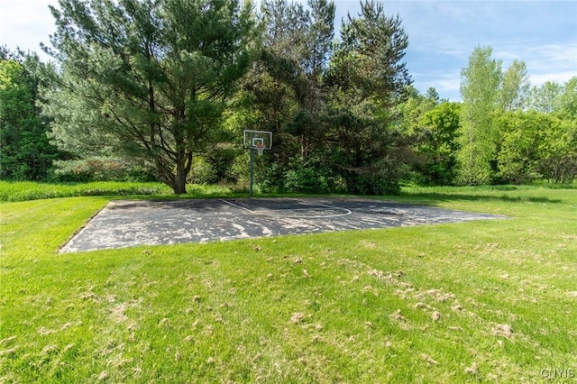 25386 Stewart Dr, Champion, NY 13619 - view of sport court with community basketball court and a yard