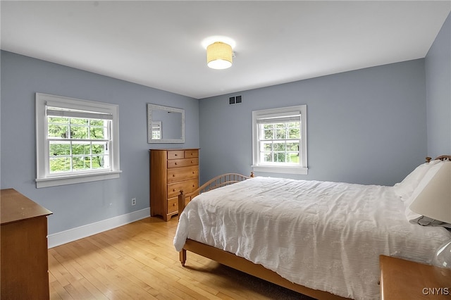 11 S Meadow Dr, Orchard Park, NY 14127 - bedroom with light wood-style flooring and baseboards