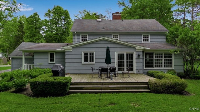 11 S Meadow Dr, Orchard Park, NY 14127 - rear view of property with a chimney, a yard, a wooden deck, and outdoor dining space