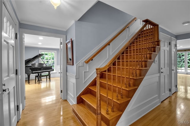 11 S Meadow Dr, Orchard Park, NY 14127 - staircase with wood-type flooring and crown molding