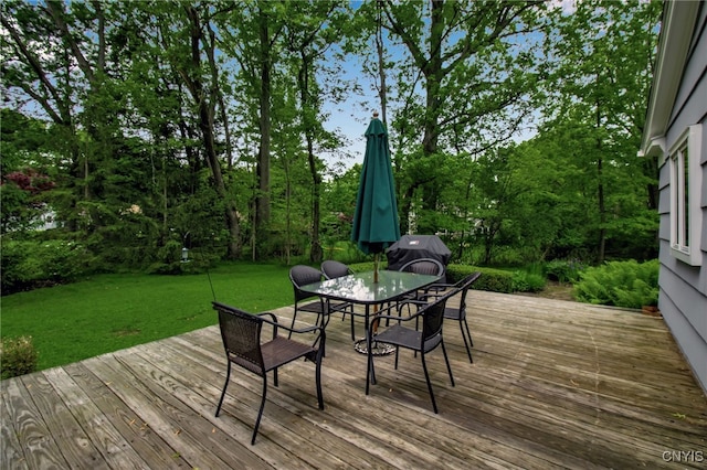 11 S Meadow Dr, Orchard Park, NY 14127 - wooden terrace with outdoor dining area, a lawn, and grilling area