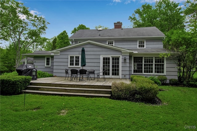 11 S Meadow Dr, Orchard Park, NY 14127 - rear view of house with a chimney, a yard, a deck, and outdoor dining area