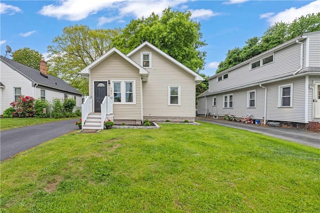 131 Pomona Dr, Greece, NY 14616 - view of front of home with a front yard
