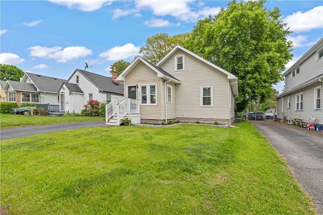 131 Pomona Dr, Greece, NY 14616 - view of front of property with a residential view and a front lawn