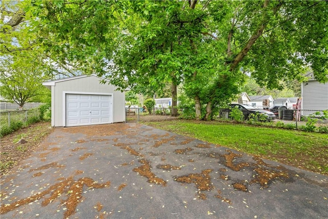 131 Pomona Dr, Greece, NY 14616 - detached garage with asphalt driveway