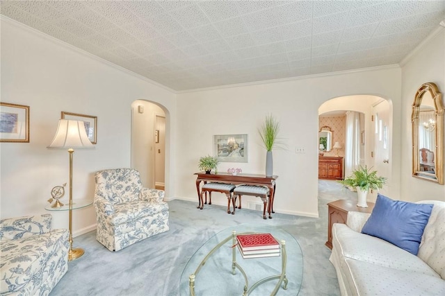 261 Hager Rd, Greece, NY 14616 - living area featuring arched walkways, ornamental molding, carpet, and baseboards