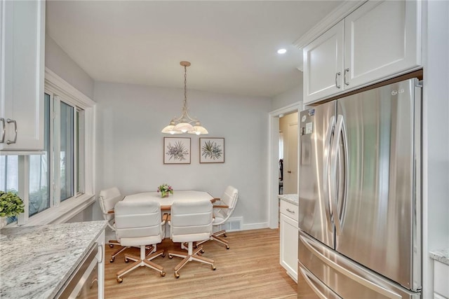 261 Hager Rd, Greece, NY 14616 - dining room featuring light wood finished floors, baseboards, and recessed lighting
