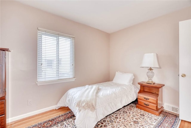 261 Hager Rd, Greece, NY 14616 - bedroom featuring light wood-style floors and baseboards