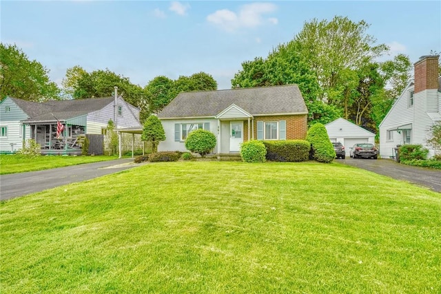 261 Hager Rd, Greece, NY 14616 - view of front of home featuring a front lawn and a garage