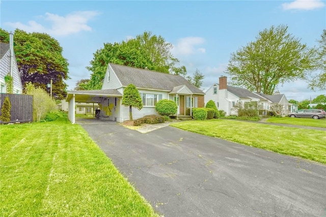 261 Hager Rd, Greece, NY 14616 - view of front of property with driveway, a front yard, and a carport