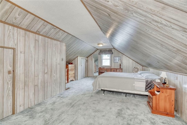 261 Hager Rd, Greece, NY 14616 - carpeted bedroom featuring wooden walls and lofted ceiling