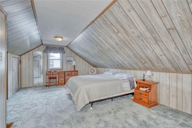 261 Hager Rd, Greece, NY 14616 - carpeted bedroom with wooden walls and vaulted ceiling