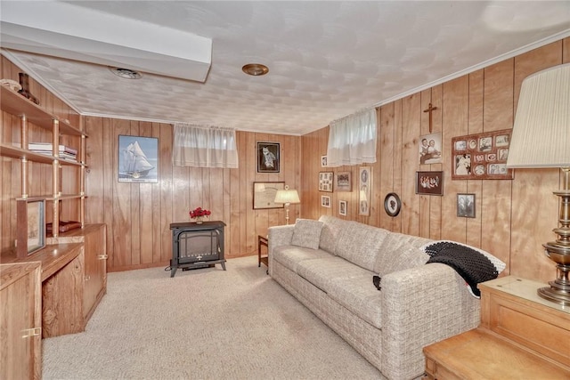 261 Hager Rd, Greece, NY 14616 - living area with a wood stove, carpet, wooden walls, and baseboards