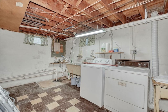 261 Hager Rd, Greece, NY 14616 - laundry area featuring washing machine and dryer and tile patterned floors