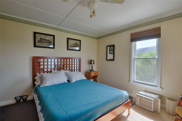 3180 Carleton Island Rd Unit 1, Cape Vincent, NY 13618 - bedroom featuring baseboards, a wall mounted AC, and carpet floors