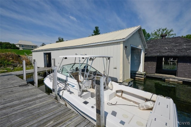 3180 Carleton Island Rd Unit 1, Cape Vincent, NY 13618 - dock area featuring boat lift