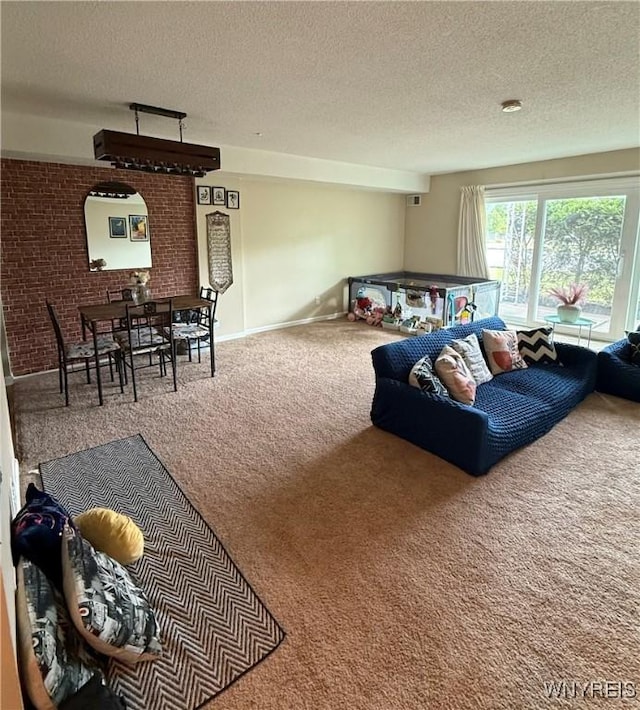 4547 Chestnut Ridge Rd Unit 104B, Amherst, NY 14228 - carpeted living area featuring a textured ceiling