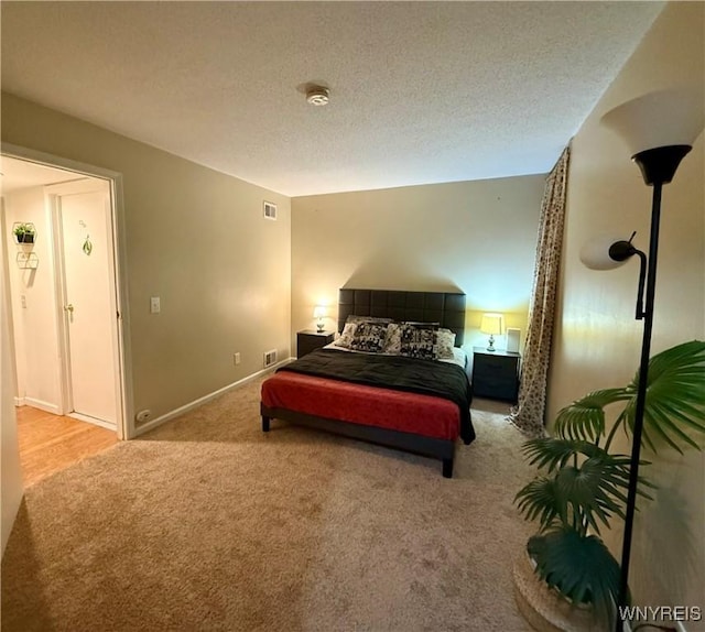 4547 Chestnut Ridge Rd Unit 104B, Amherst, NY 14228 - bedroom featuring carpet, a textured ceiling, and baseboards
