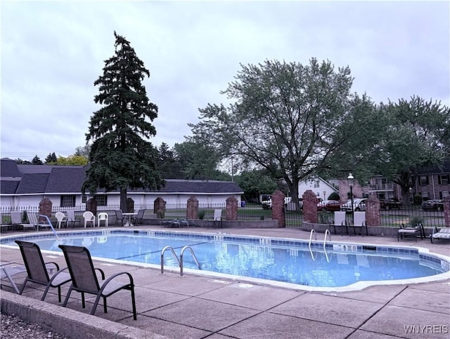 4547 Chestnut Ridge Rd Unit 104B, Amherst, NY 14228 - community pool featuring a patio area