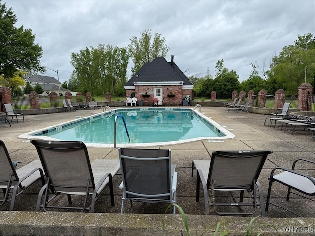 4547 Chestnut Ridge Rd Unit 104B, Amherst, NY 14228 - community pool featuring a patio area
