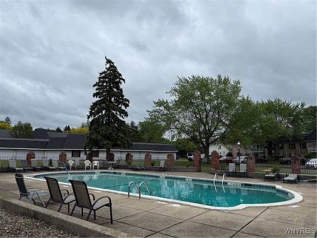 4547 Chestnut Ridge Rd Unit 104B, Amherst, NY 14228 - community pool featuring a patio area