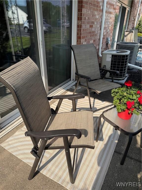4547 Chestnut Ridge Rd Unit 104B, Amherst, NY 14228 - balcony with central AC